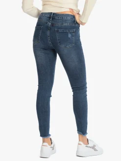 New Collection Jeans slim fit con strappi da donna