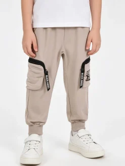 Run Boy Pantaloni da bambino cargo con polsini - taupe