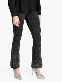 Solada Pantaloni donna a zampa con borchie luccicanti