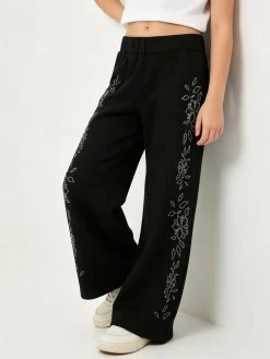 Sweet Junior Pantaloni da bambina a gamba larga con strass floreali - nero